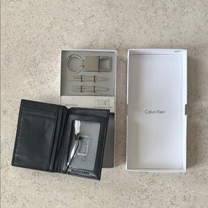 Calvin Klein Black Wallet and Silver KeyChain and Stays